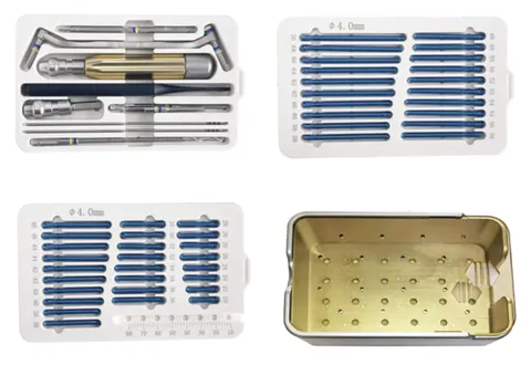 Instrument tray with drivers, guide wires and reamers beside racked cannulated screws and a sterilisation case