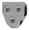 Small triangular block pierced by three round openings
